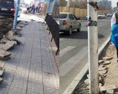 50 сантиметр хүрэхгүй нарийхан явган хүний замын голд шон тавьчихсан тохиолдол байна